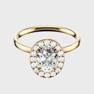 A gold ring showcases an oval diamond surrounded by smaller diamonds, resting against a plain, light gray background.