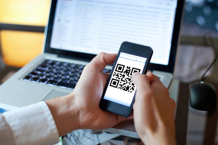smart phone with qr code on the screen