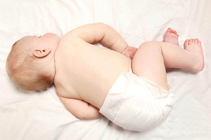 Peaceful baby sleeping in a bed, close up