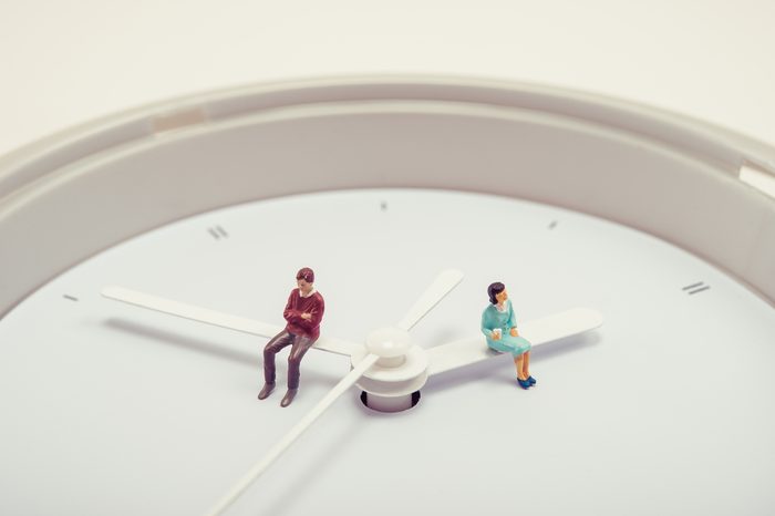 Men and women sitting on watch