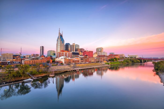Nashville, Tennessee downtown skyline with Cumberland River in USA