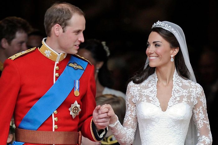 Britain's Prince William and his wife Kate, Duchess of Cambridge stand outside of Westminster Abbey after their Royal Wedding in London Friday, April, 29, 2011