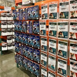 Costco wholesale warehouse shopping aisle for coupons and discounted gift cards, a members only club.