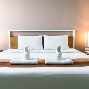 Interior of a luxury double bed hotel bedroom