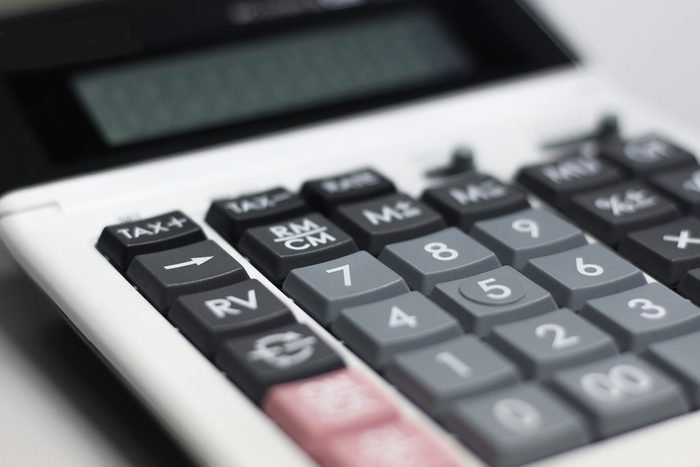 Close up button calculator , calculator on table