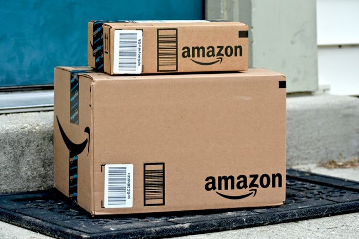MARYLAND, USA - FEBRUARY 04, 2016: Image of Amazon packages delivered to a home. Amazon is the largest internet based retailer in the United States.