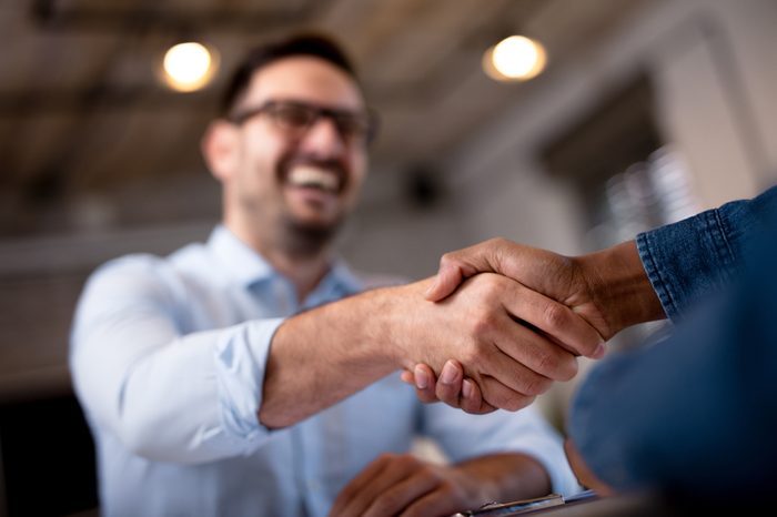 Business people shaking hands.