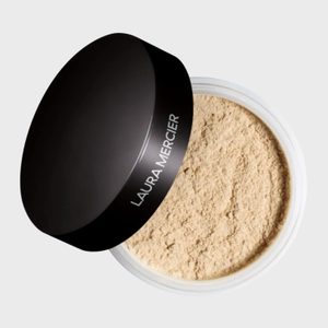 Open cosmetic jar displays light beige powder; black lid labeled 