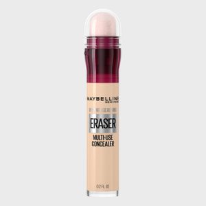 A concealer stick rests upright, featuring a sponge applicator top, with text 