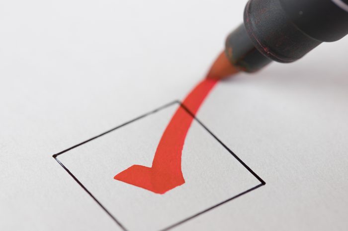 Macro photography of check mark on white background