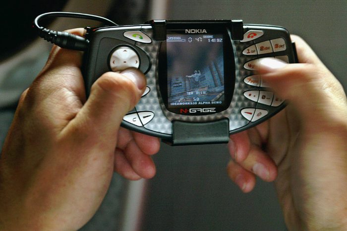 N-GAGE A player tries ActiVisions Tony Hawks Pro Skater video game release on the "N-Gage," Nokia's newest hybrid phone, in Los Angeles. Nokia announced the wireless game device, N-Gage, on the second day of the games industry trade show Electronic Entertainment Expo E3 conference. The Tri-band EGSM 900/GSM1800/GSM 1900 phone included features: Bluetooth, digital music player and recorder, stereo FM radio, MP3, AAC, Midi, WAV ringing tones, and WAP over GPRS