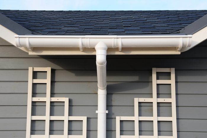 Rain Gutter System and Bitumen Roof Shingles. 