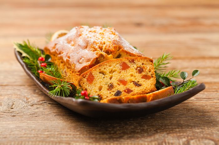 Christmas cake. Fruitcake. Natural wooden background. Top view.