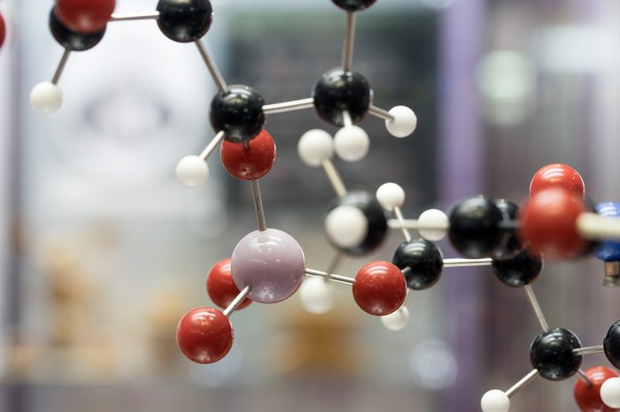 Molecular, DNA and atom model in science research lab