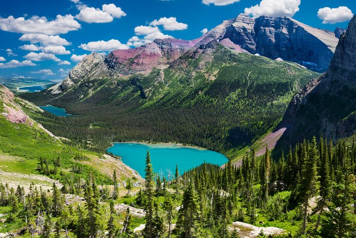 Breathtaking view of a chain of glacial lakes from atop the Grinnell Glacier Trail in Montana