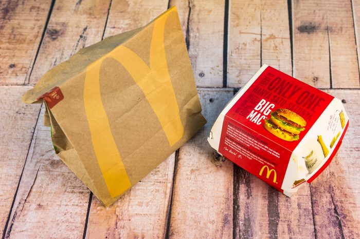 KUALA LUMPUR, MALAYSIA - JAN 28TH, 2017 :Big Mac on wooden table with blue background.