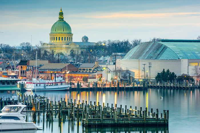Annapolis, Maryland, USA town skyline at Chesapeake Bay with the United States Naval Academy Chapel dome.