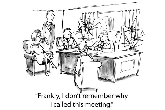 Executive at desk confesses forgetfulness in meeting room with attentive colleagues. Text: "Frankly, I donâ€™t remember why I called this meeting."