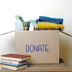 Box holds clothes and toiletries, labeled 