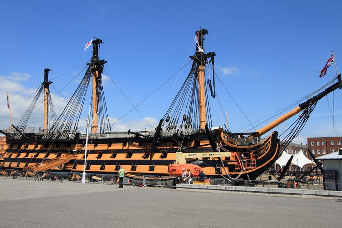 PORTSMOUTH, UK - JUNE 12, 2014: View of Portsmouth historical dockyard on June 12, 2014 in Portsmouth, UK. Historical warships of the UK royal navy are displayed in this landmark dockyard.