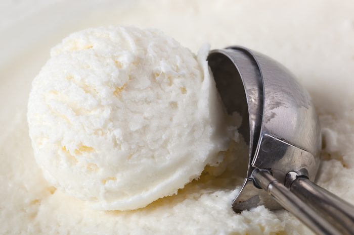ice cream in a bowl with leaf