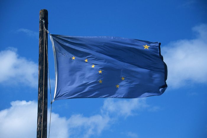 State Flag of Alaska against the sky