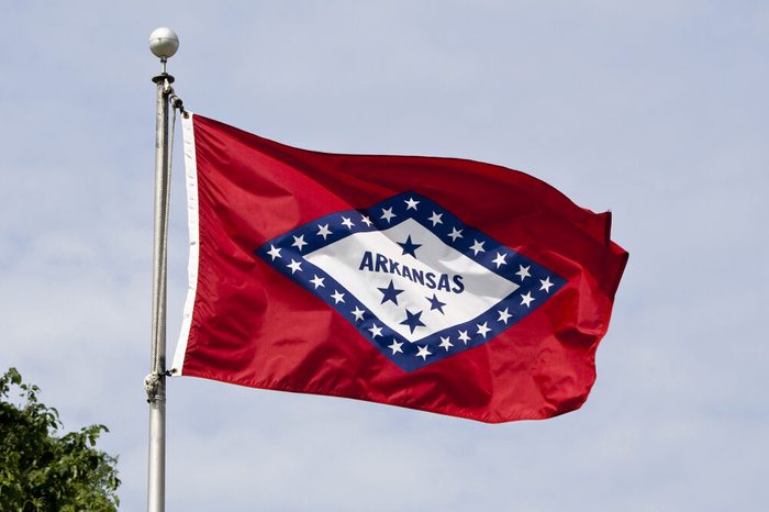 The Arkansas State Flag flying in the wind