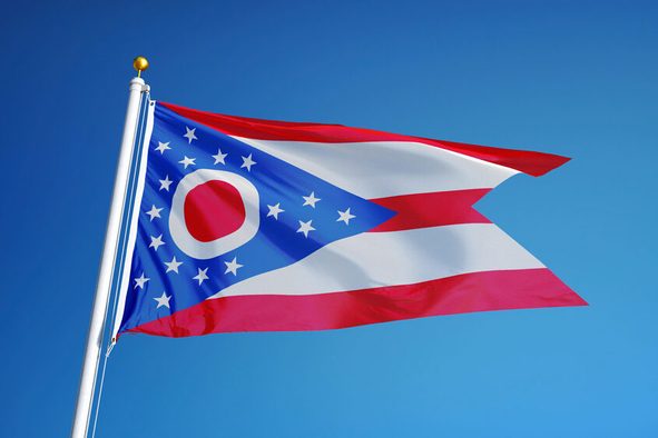 Ohio (U.S. state) flag waving against clear blue sky, close up, isolated with clipping path mask alpha channel transparency, perfect for film, news, composition