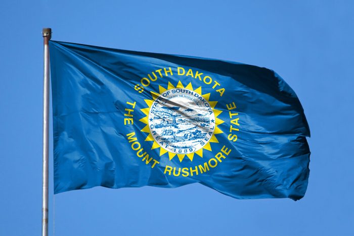 National flag State of South Dakota on a flagpole
