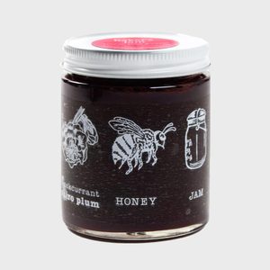 Jar displays illustrations of fruit, a bee, and jar. Labels read 
