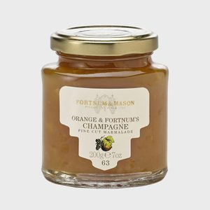 Jar holds marmalade with gold lid, labeled 