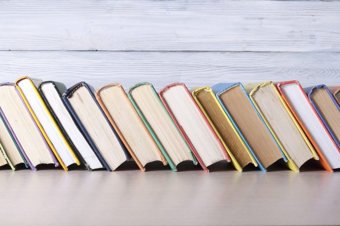 Stack of colorful books. Education background. Back to school. Copy space for text