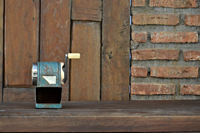 old pencil sharpener out of order,vintage wall