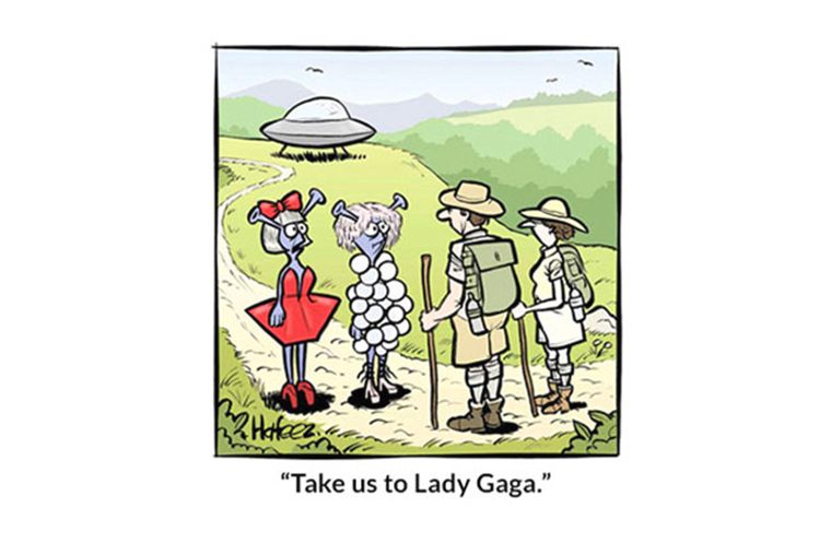 Aliens in costumes approach hikers on a path, asking, â€œTake us to Lady Gaga.â€ A flying saucer hovers in the background over hills.