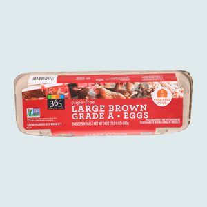 Egg carton displays â€œLarge Brown Grade A Eggs,â€ cage-free, on a red label with chickens, non-GMO verified, 24 oz, 12-count packaging.