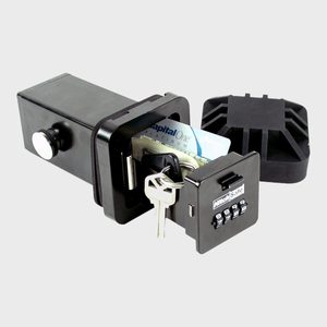 Safe opened, revealing keys and a credit card, in a black enclosed box with a combination lock, situated on a plain white background.