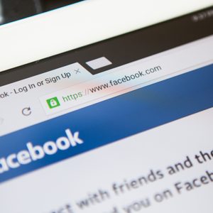 Browser displays Facebook login page, showing URL with lock icon, indicating security; text partially visible below in a casual format.