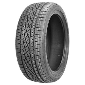 Tire stands upright, displaying intricate tread patterns; isolated on a plain white background. Text reads 