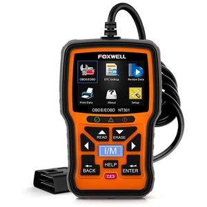 Device displays diagnostic options on screen, resting on a surface. Buttons include 