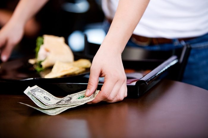 Coffee Shop: Server Picking Up a Cash Tip