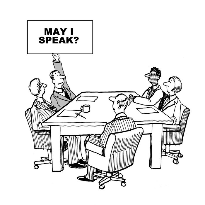The shy businessman raises a sign that says: May i speak?