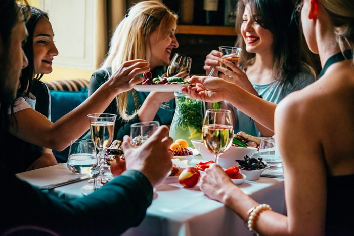 Party dinner table, celebrating with friends of family served at home or in a restaurant.