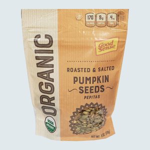 A bag of organic roasted and salted pumpkin seeds, labeled 