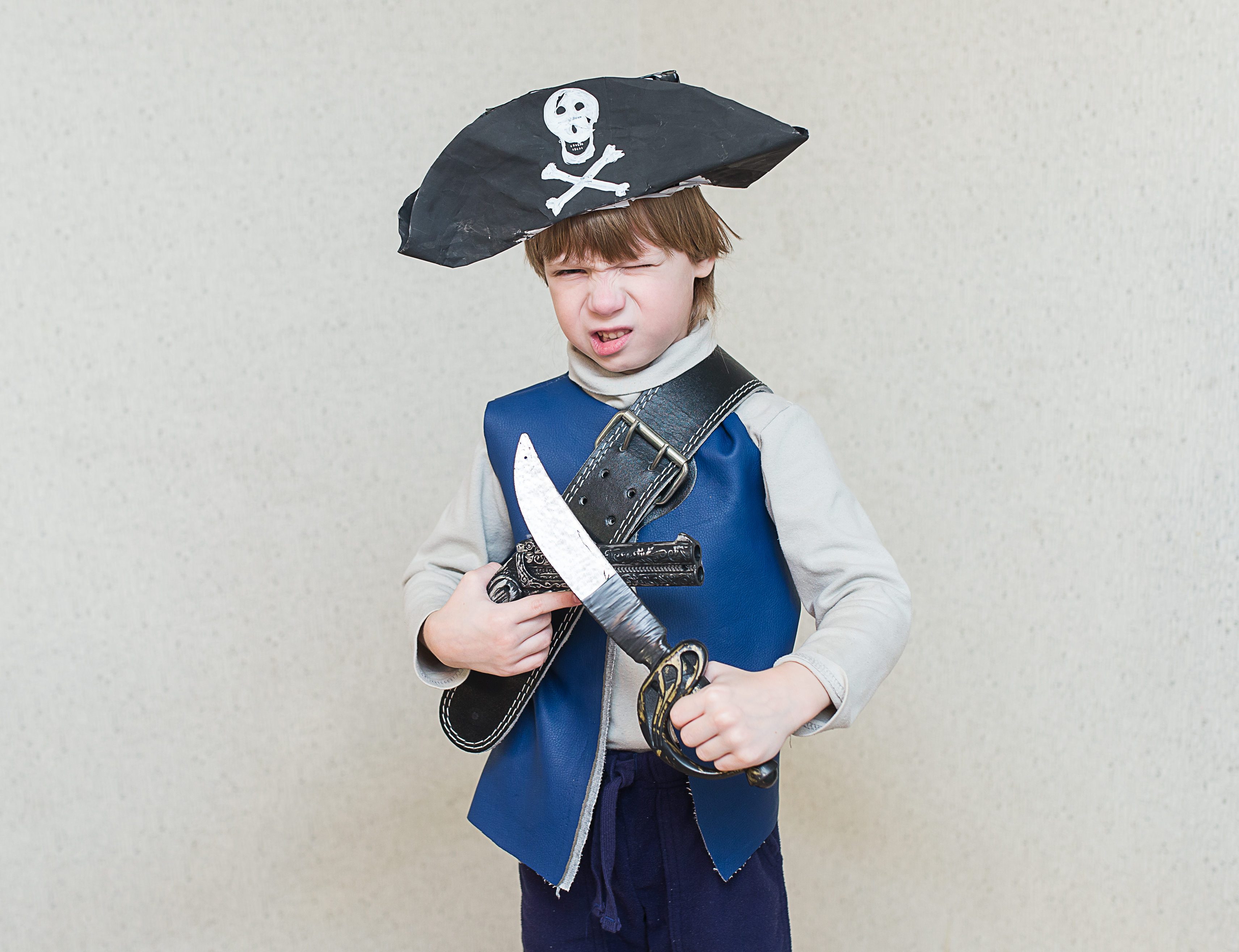 child boy playing pirate.