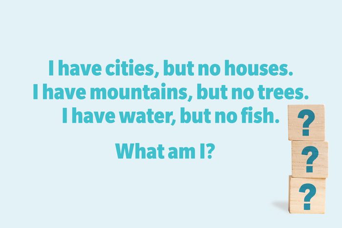 I have cities, but no houses. I have mountains, but no trees. I have water, but no fish. What am I?