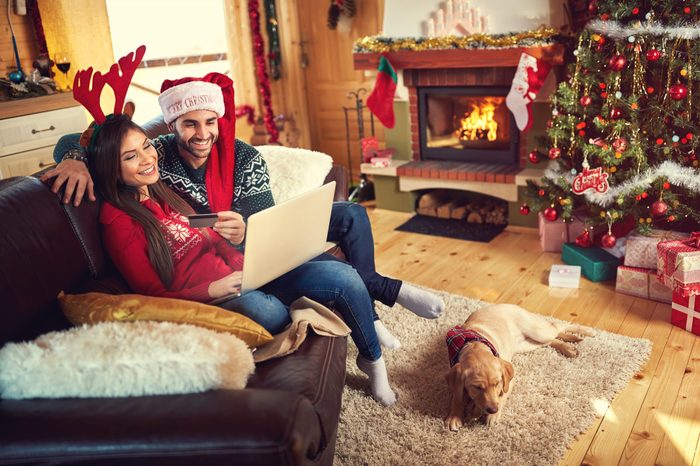 Male and female shopping on line, from internet 