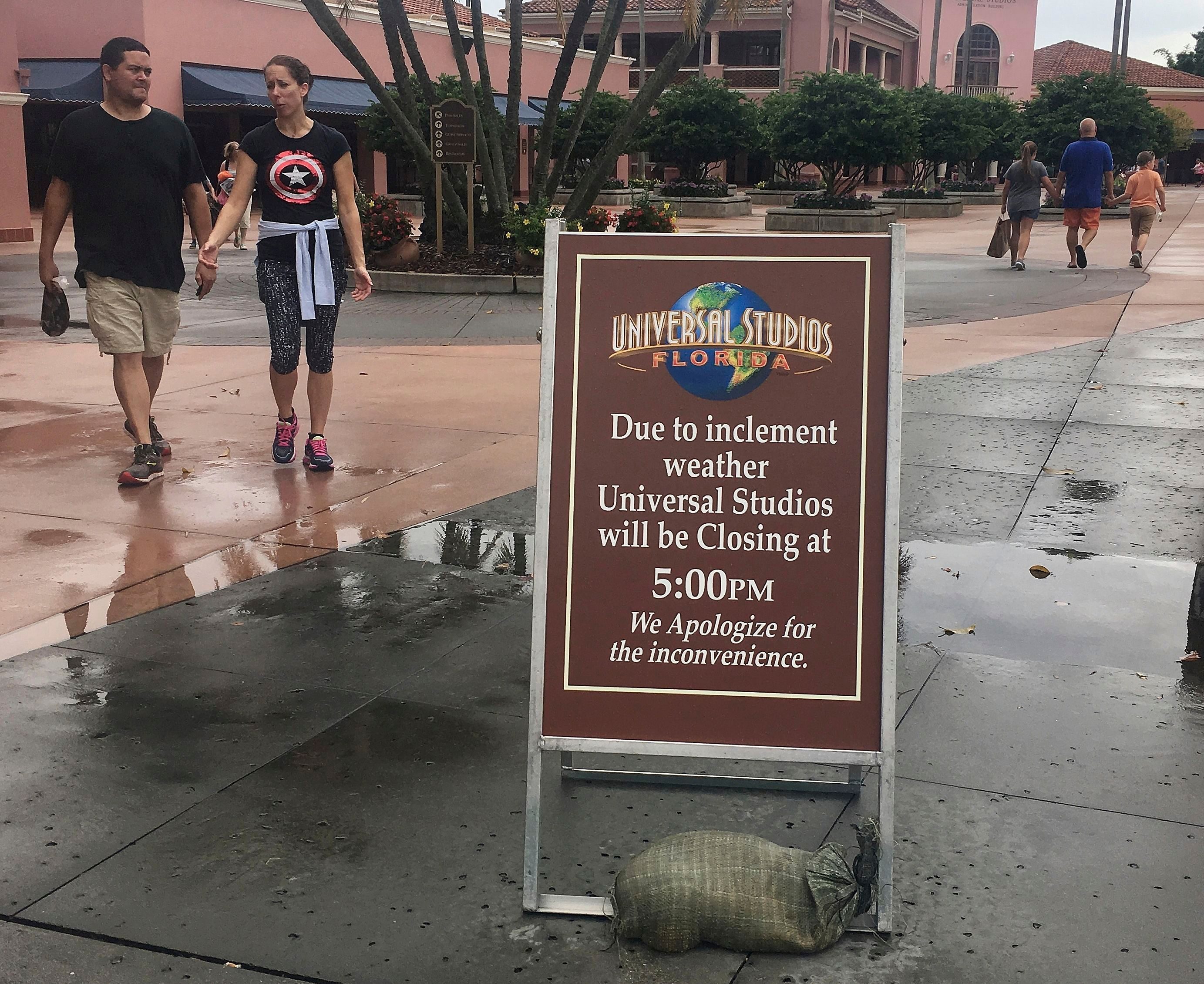 Mandatory Credit: Photo by Janelle Cogan/AP/Shutterstock (6099241a) Park guests depart from Universal Studios, in Orlando, Fla. Leaving more than 100 dead in its wake across the Caribbean, Hurricane Matthew steamed toward heavily populated Florida with terrifying winds of 140 mph Thursday, and 2 million people across the Southeast were warned to flee inland. In inland Orlando, Walt Disney World, Universal Studios and SeaWorld announced plans to close early today Hurricane Matthew, Orlando, Florida, USA - 06 Oct 2016