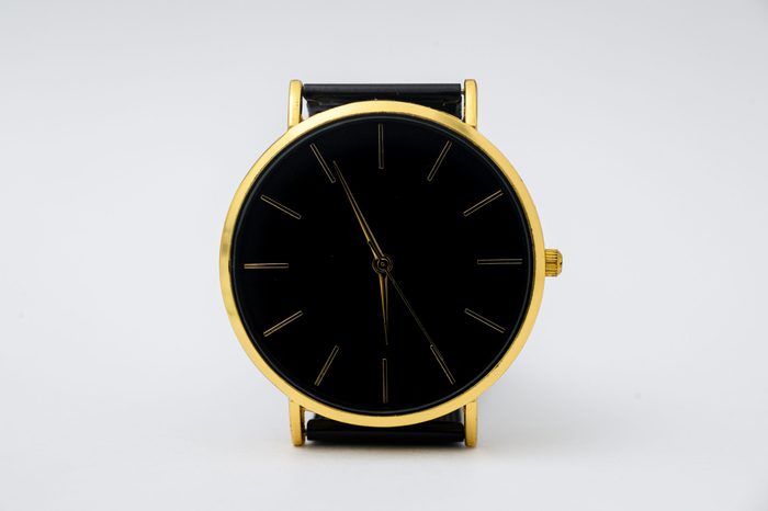 Black watch for men on white background.