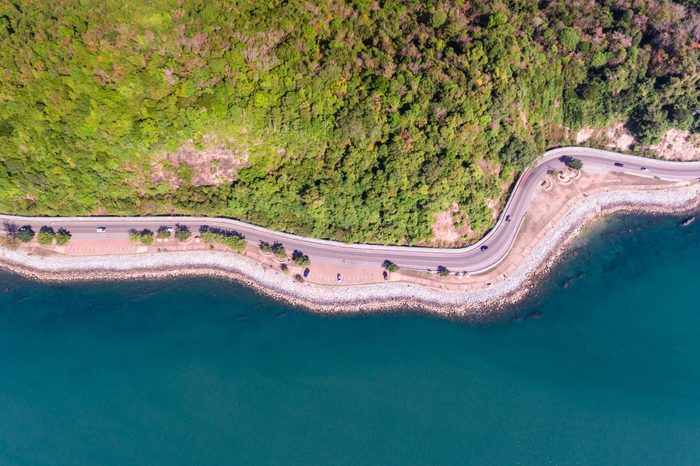 Aerial view of road on sea coastal. 