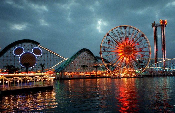 Mandatory Credit: Photo by Damian Dovorganes/AP/Shutterstock (6476118a) CALIFORNIA ADVENTURE Midway-type rides, one sporting the outline of Disney's famous character, Mickey Mouse, are seen, at California Adventure in Anaheim, Calif., the latest addition to the Walt Disney theme park family. The park, adjacent to Disneyland, opens Feb. 8 and will feature miniature versions of the best the state has to offer, from historic landmarks to its natural terrain, wrapped around rides, stores and restaurants TRAVEL NEW DISNEY PARK, ANAHEIM, USA